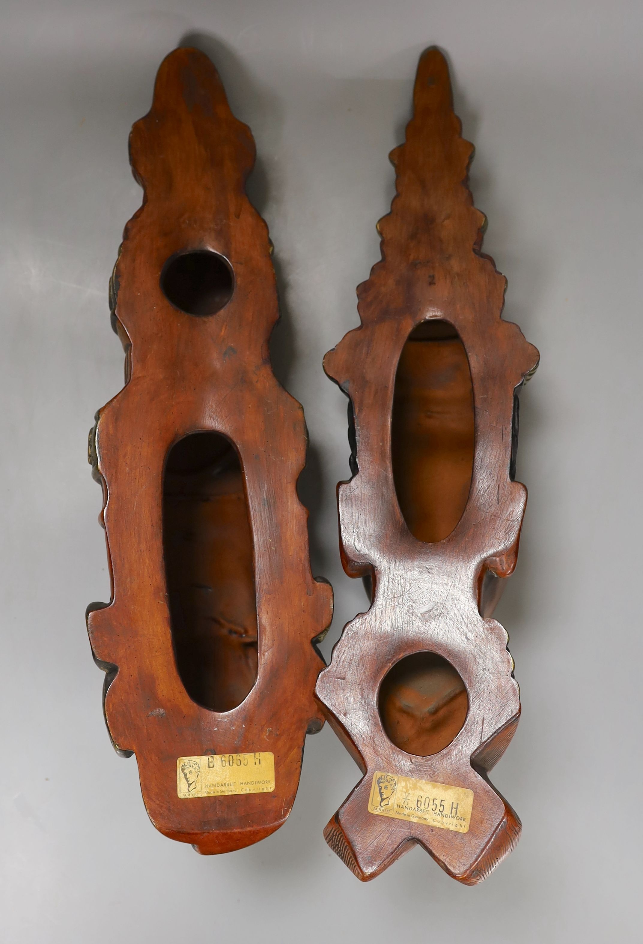 Two German Achatit wall masks - 46cm tall